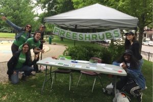 LEAF staff and volunteers posing by the free native shrub giveaway table(© 2019 Erin MacDonald / LEAF)
