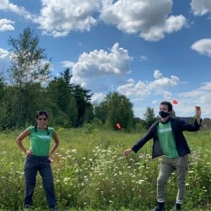 Young woman and man standing in a field(© 2020 Annabella Aoshana / LEAF)
