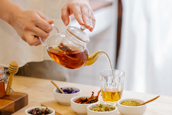 A warming moment, capturing the ritual of blending and brewing.