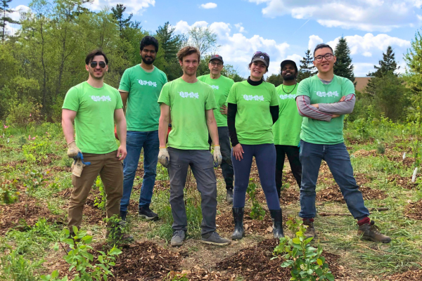Six LEAF volunteers posing together at a community planting event