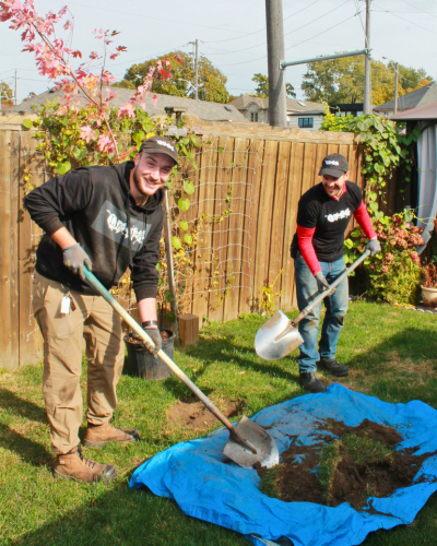 The LEAF team planting a client's tree