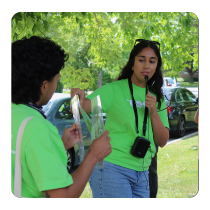 two Young Urban Forest Leaders leading a tree tour