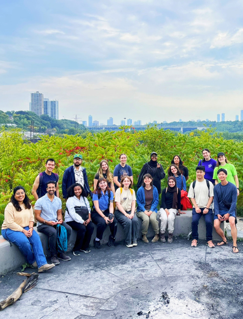 group of youth posing together at a viewing area near a Toronto ravine