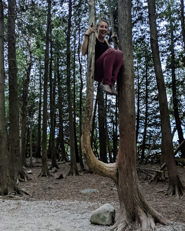 Sarah hanging with some cedars(© 2023 LEAF)
