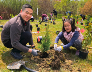 Participants at a LEAF community planting event 