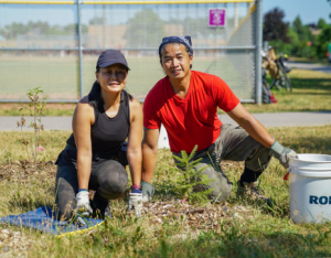 Two volunteers participating at a LEAF stewardship event