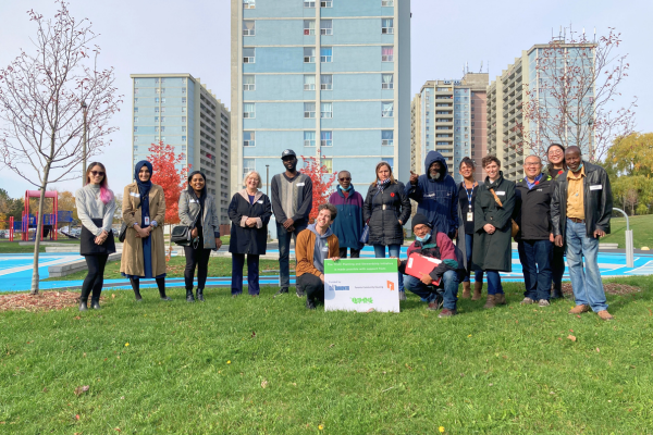 Group of people posing for picture at a TCHC recognition event.(© 2022 Lam Tran / LEAF)