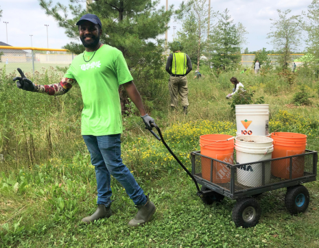 A volunteer participating at a LEAF stewardship event
